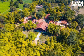 StayVista's Rustic Respite - Hillside Retreat near Tala Gate with Swimming Pool, Lawn & Indoor-Outdoor Games